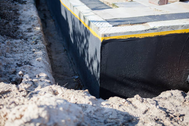 Professional Interior Drainage System technician working in Kingston, IL
